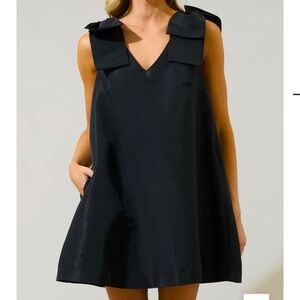 Elegant Black Sleeveless Dress with Bow Details